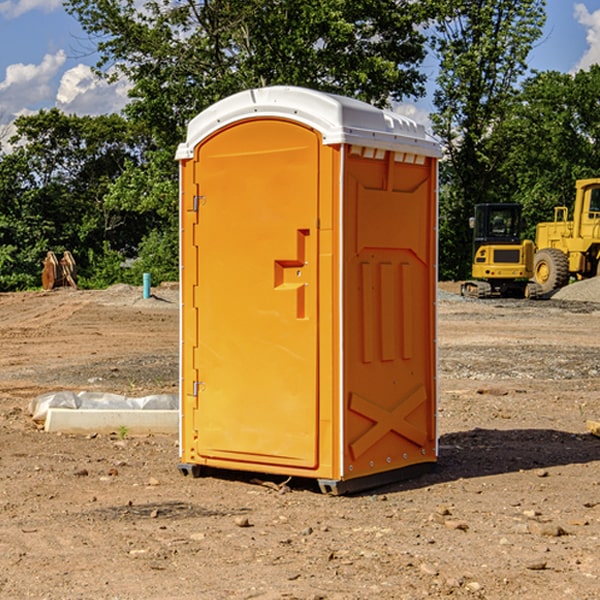 how often are the portable restrooms cleaned and serviced during a rental period in Vernon County